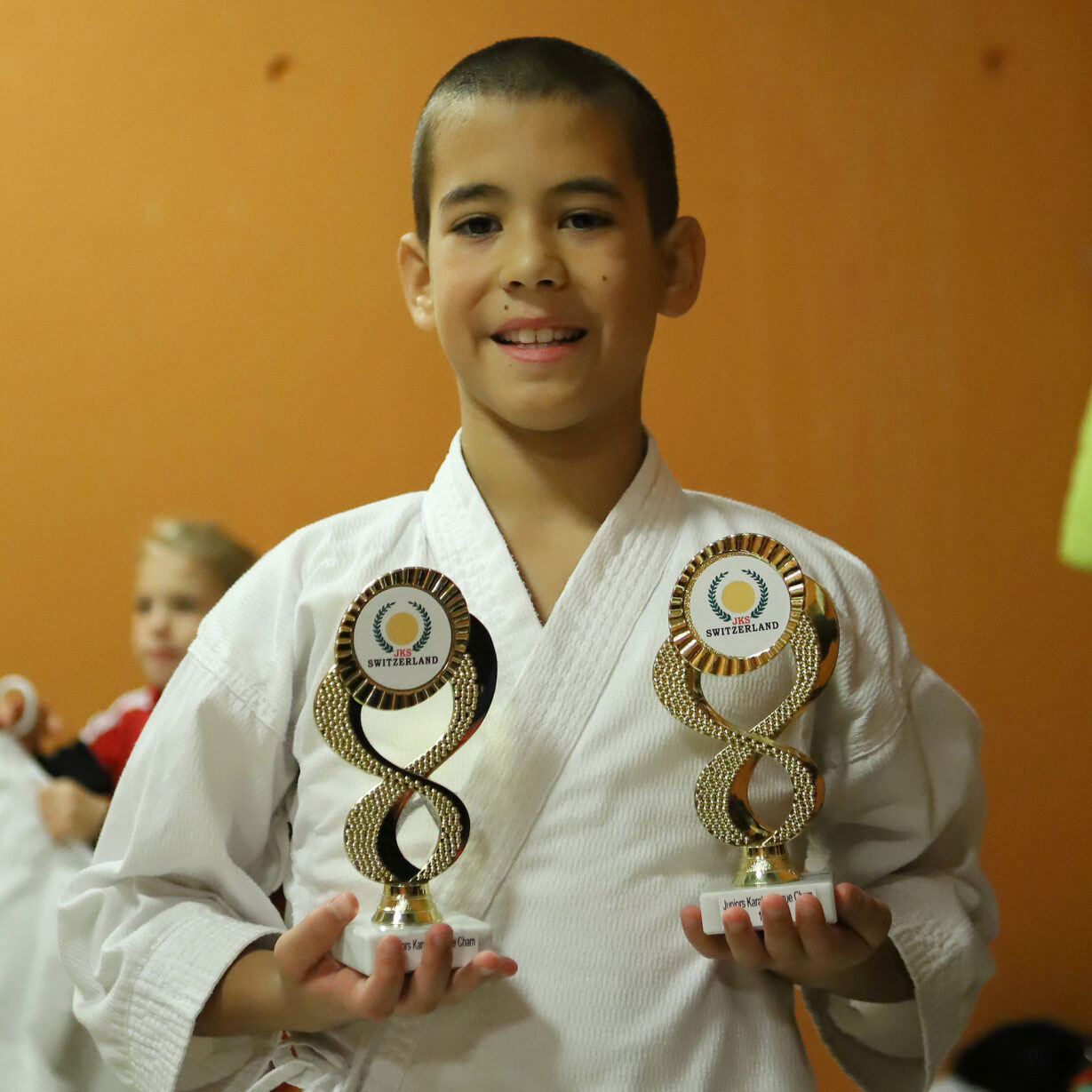 Colin McGuinness at the Junior Karate League in Cham 2023 Colin McGuinness showing both his golden cups at the Junior Karate League in Cham 2023