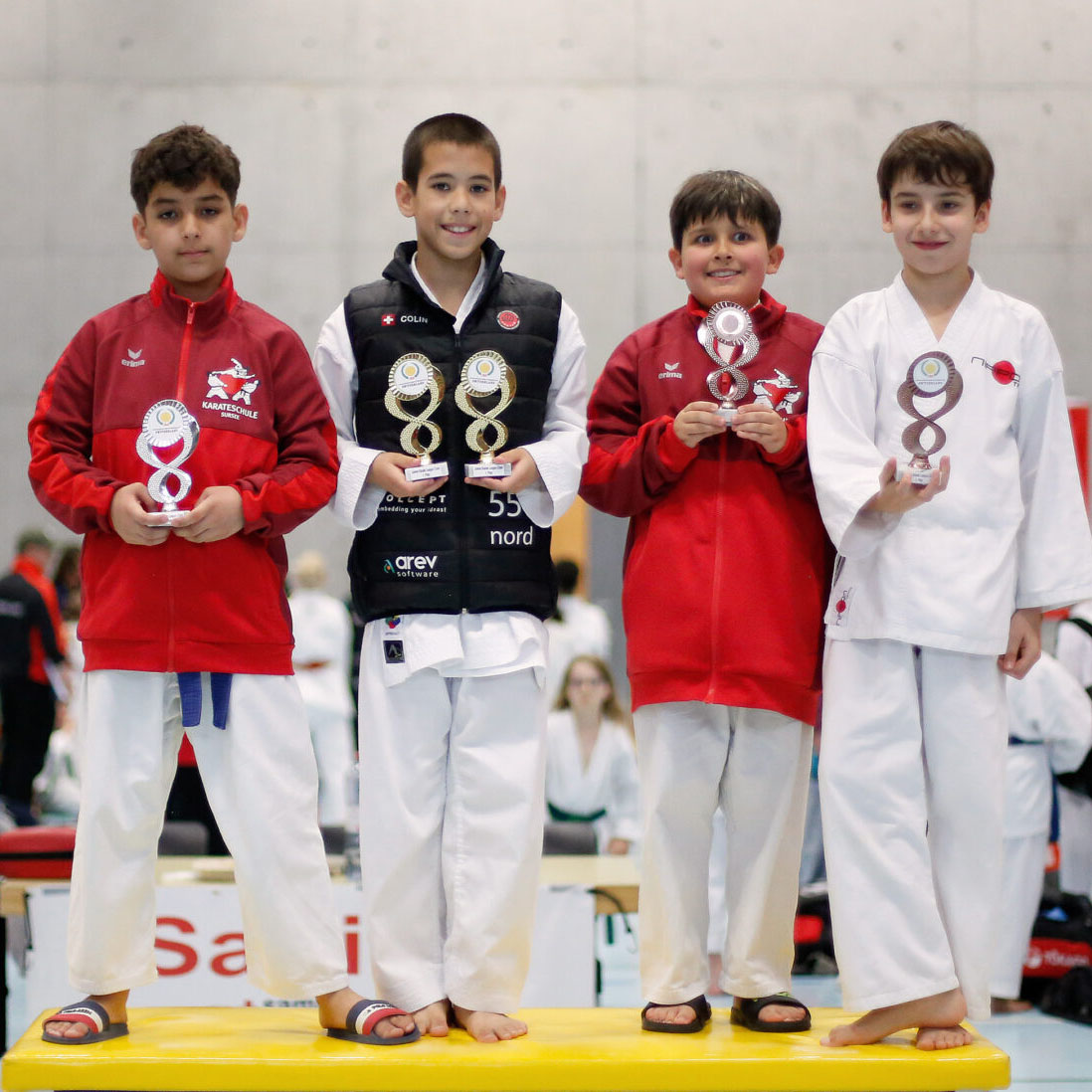 Colin McGuinness at the medal ceremony at the Junior Karate League in Cham 2024 Colin McGuinness showing both his golden cups at the Junior Karate League in Cham 2024